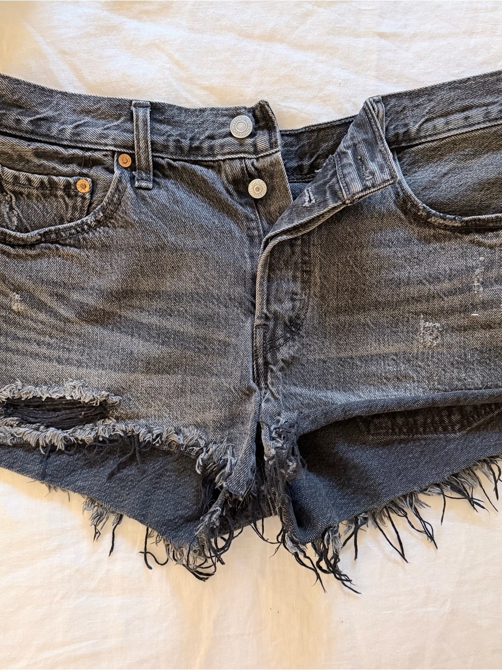 Levi’s 501 Distressed Black Denim Shorts